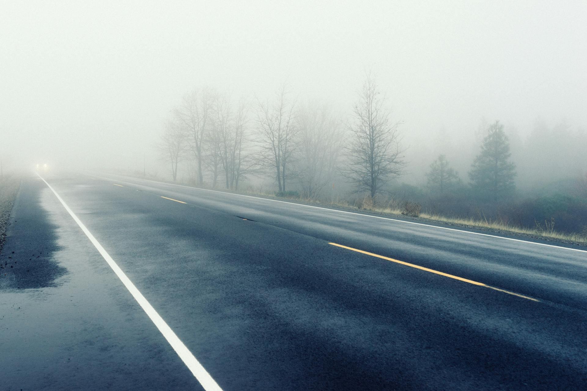 Grey Concrete Road Covered by Fogs · Free Stock Photo