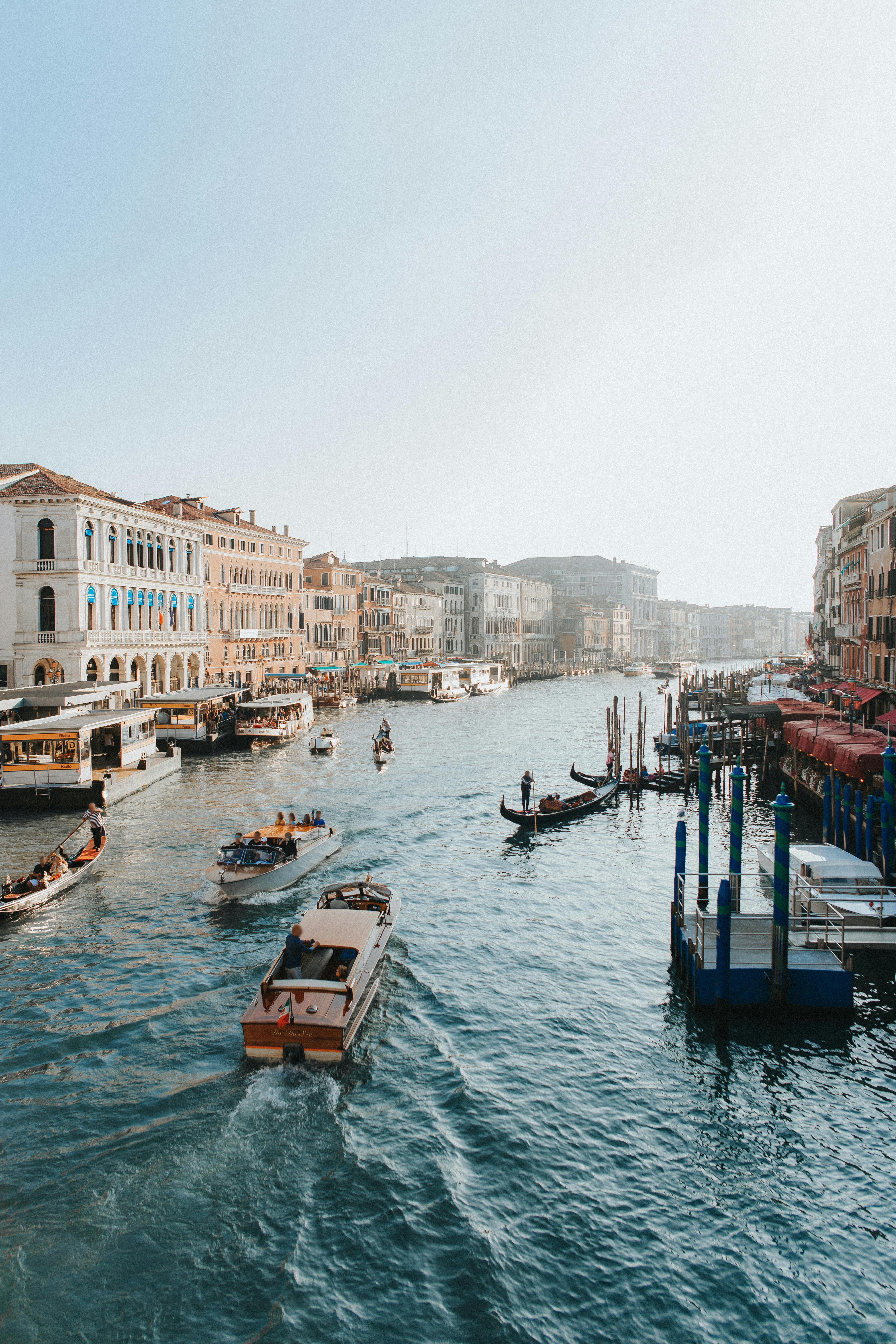 boats on water near buildings