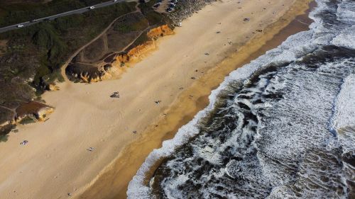 Free Stunning aerial shot of Half Moon Bay's scenic coastline and waves. Stock Photo
