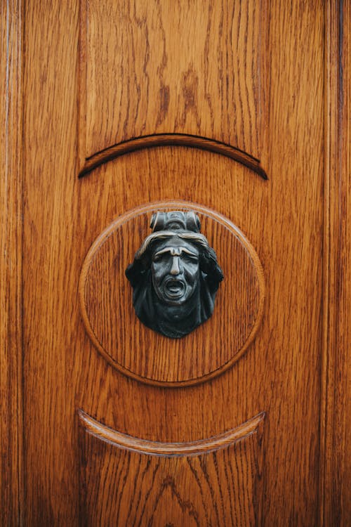 Close-up of a Figurine on a Door