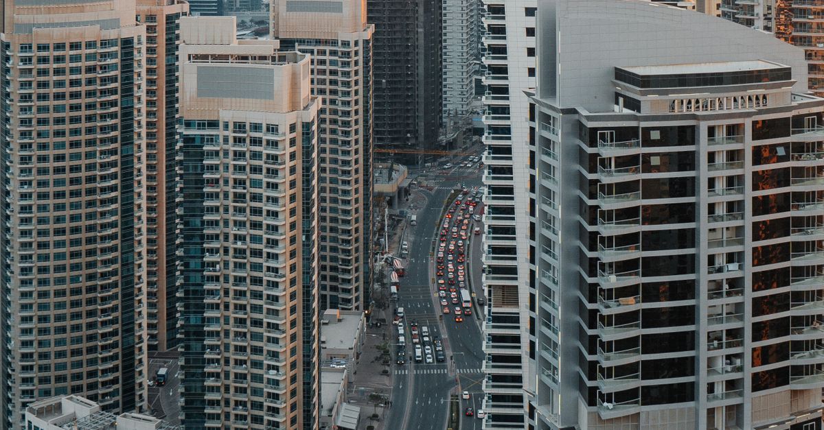 A Road Between High Rise Buildings · Free Stock Photo