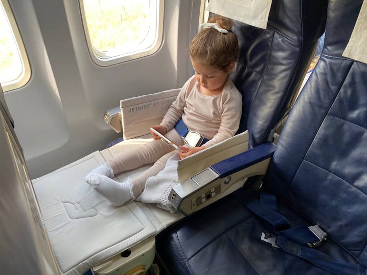 Girl Inside An Airplane