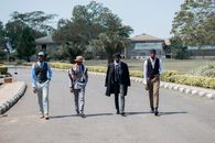 People Walking in Street in Village