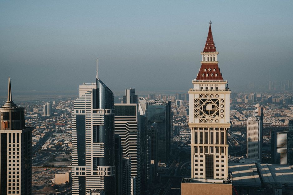 Ultimate The View At The Palm Jumeirah Dubai Tickets Review 2026 - Aerial view of Dubai's iconic skyline with Al Yaqoub Tower and modern skyscrapers under a clear sky.