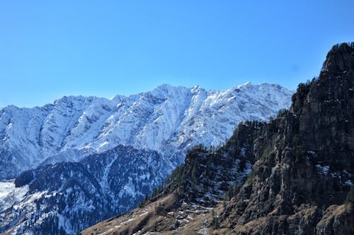 Gratis Immagine gratuita di catene montuose, cielo azzurro, montagna Foto a disposizione