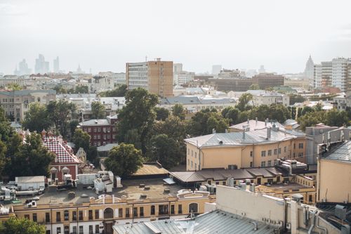 Free A wide-angle shot of Moscow, showcasing urban architecture and lush greenery. Stock Photo