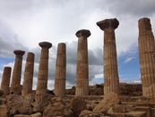 Brown Concrete Pillars Under Blue Sky