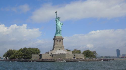 Free Iconic view of the Statue of Liberty on a sunny day in New York City, USA. Stock Photo