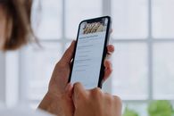 Person Holding Black Android Smartphone