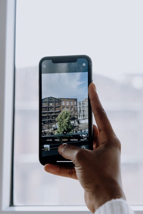 Free Person Holding Black Iphone 5 Stock Photo