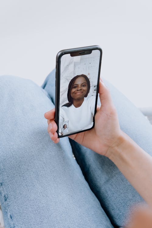 Free Person Holding Iphone With Black Case Stock Photo