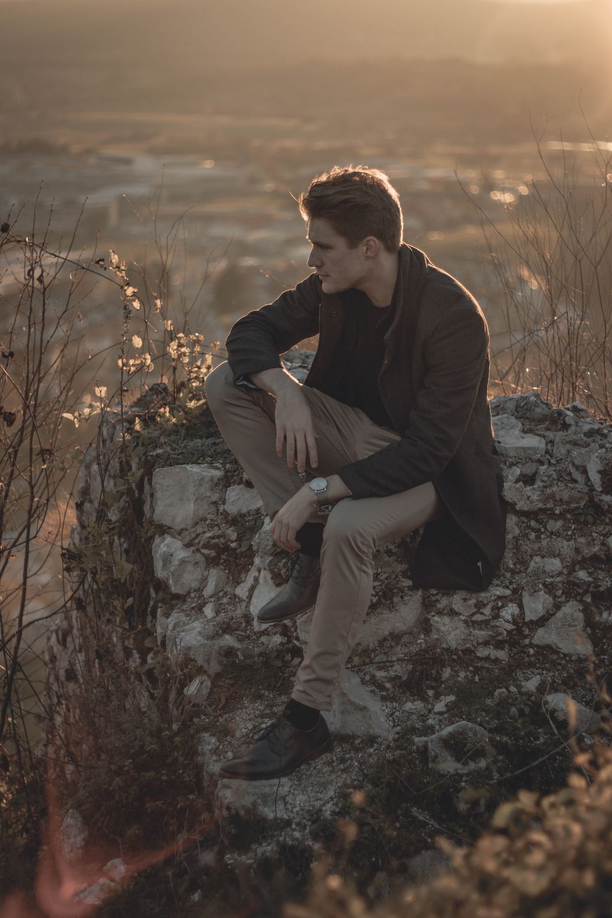 Man in quiet reflection, representing the internalized presentation of psychiatric conditions common in adult men