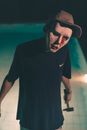 Man in Black Crew Neck T-shirt Wearing Black Sunglasses