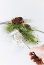 Person Holding Silver Spoon With Green Powder