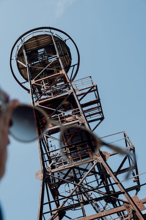 Low Angle Shot of a Tall Metal Tower under Blue Sky