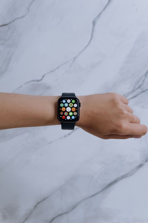 Smartwatch with a blue sport band and colorful display