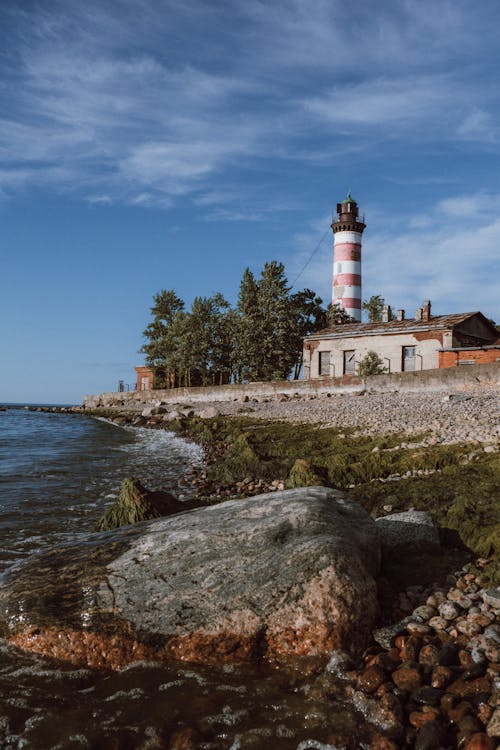 Lighthouse Near a Rocky Shore