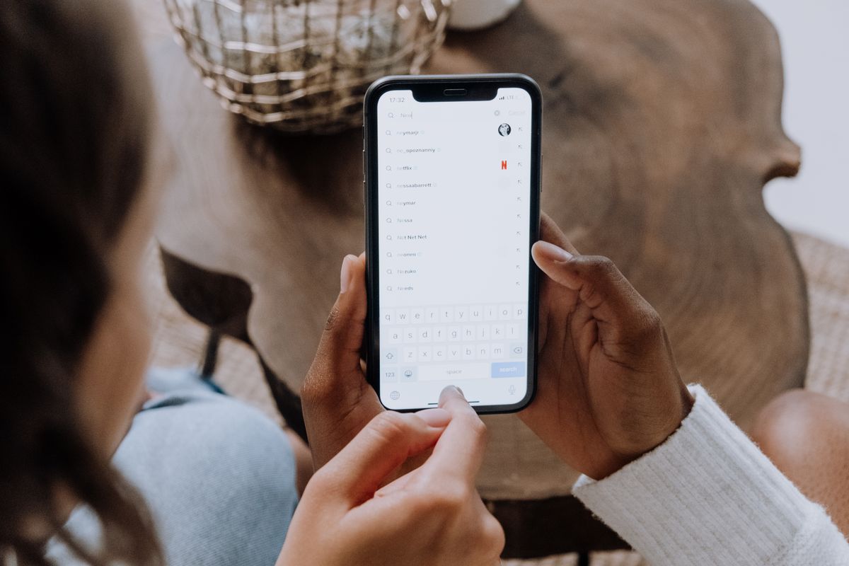 A person learning to update apps on your phone using the app store