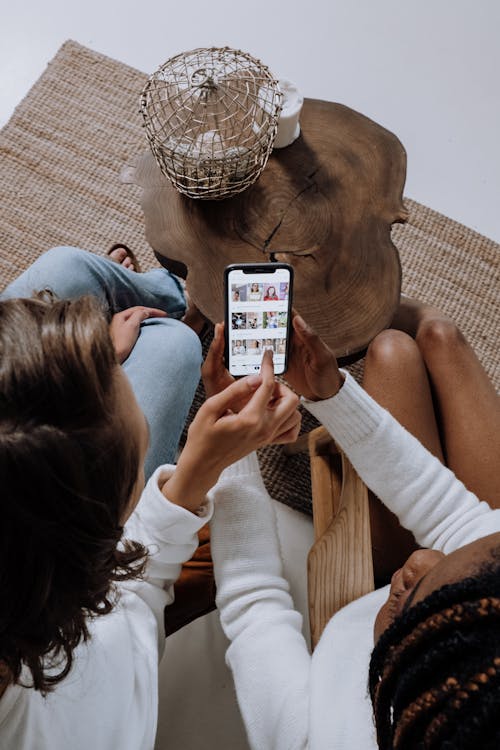 Free People Using a Smartphone Stock Photo