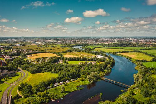 Free A beautiful aerial view of the River Shannon and surrounding landscapes in Limerick, Ireland. Stock Photo