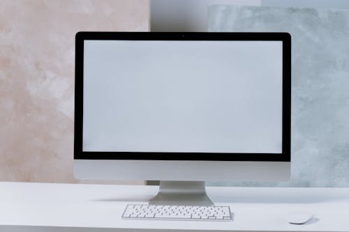 Silver Imac on White Table