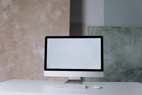 Silver Imac on White Table