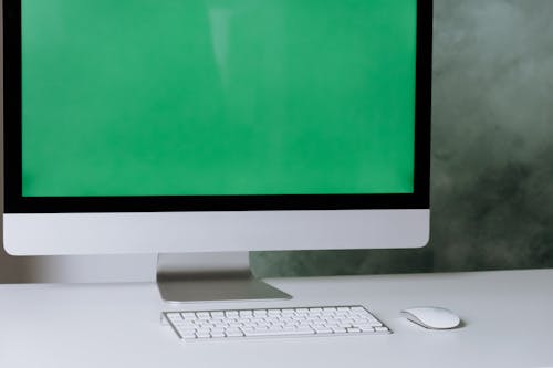 Free Silver Imac With Apple Keyboard Stock Photo