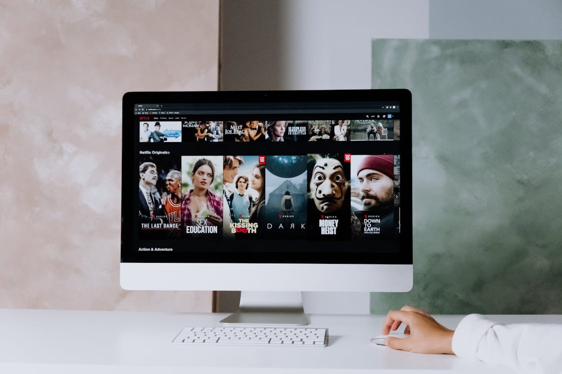 Apple TV Paramount Free Netflix on an Imac Stock Photo