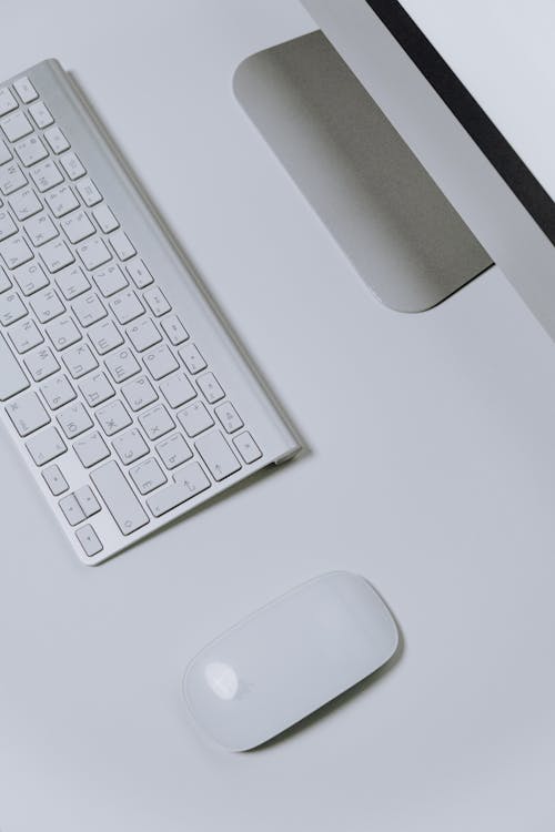 Kostenloses Stock Foto zu apple magic tastatur, arbeitsplatz, büro