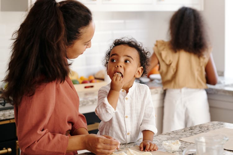 Mother And Child In The Kitchen