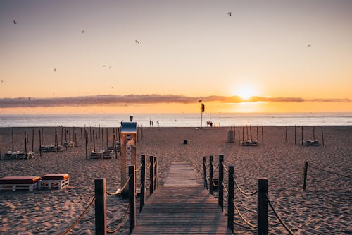 Gratis lagerfoto af promenade, solnedgang, strand Lagerfoto