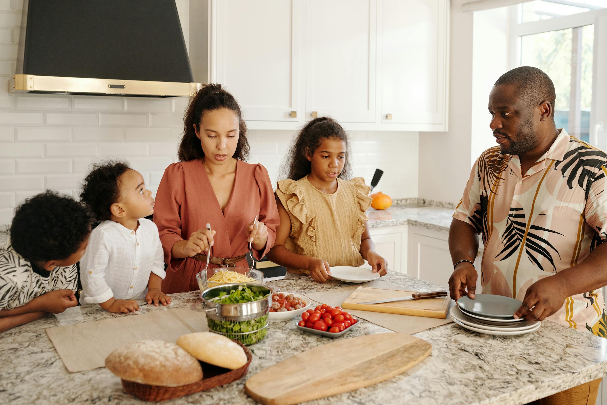 Family with young children in clean, healthy home environment