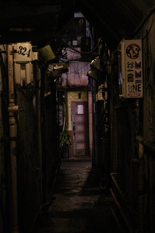 A Narrow Dark Alley in Urban Area