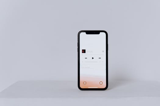A minimalist smartphone displaying a music app set against a white background.