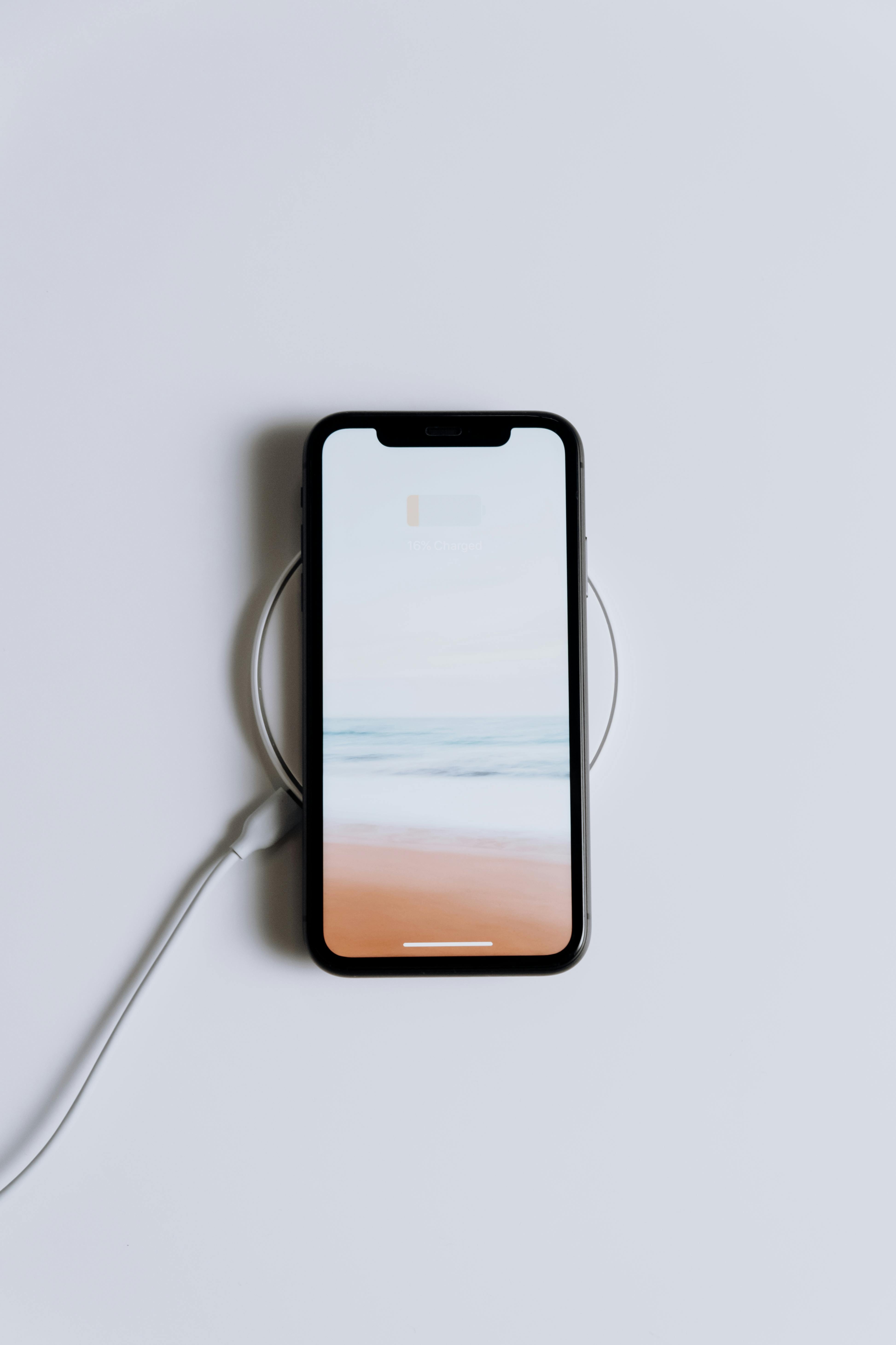 black android smartphone on white table