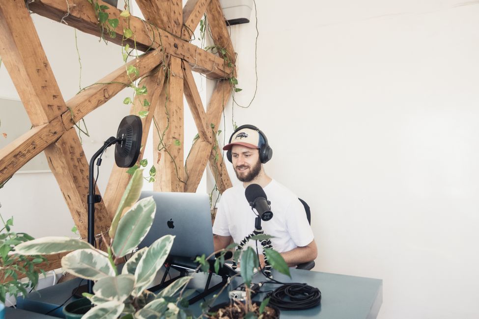 Politician wearing podcast headphones