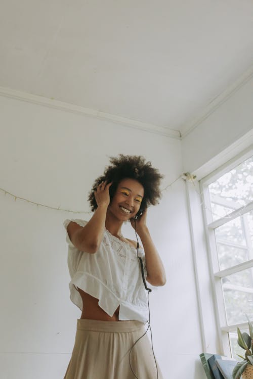 Woman with Afro Hair Smiling