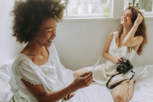 Free A Woman Looking at a Photograph Stock Photo