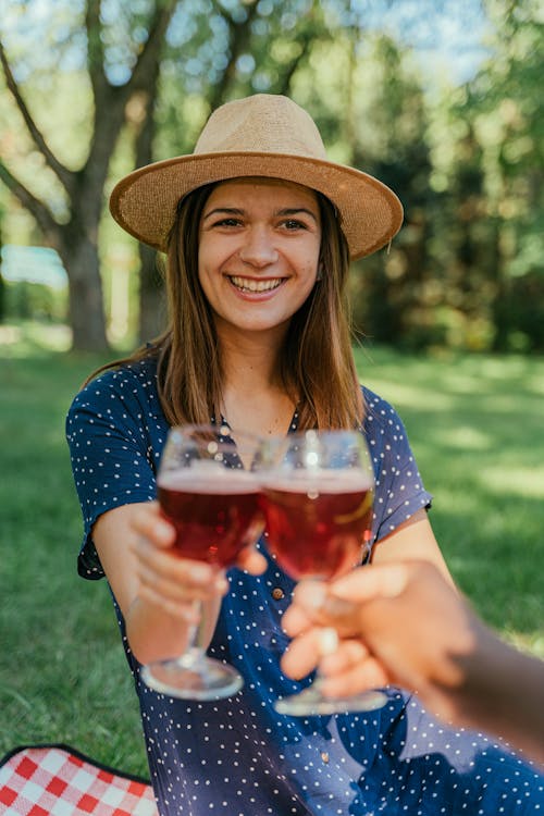 Woman Smiling While Having a Cheers