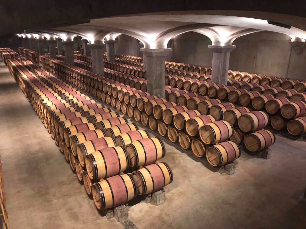 A vaulted cellar of ageing Greek wine