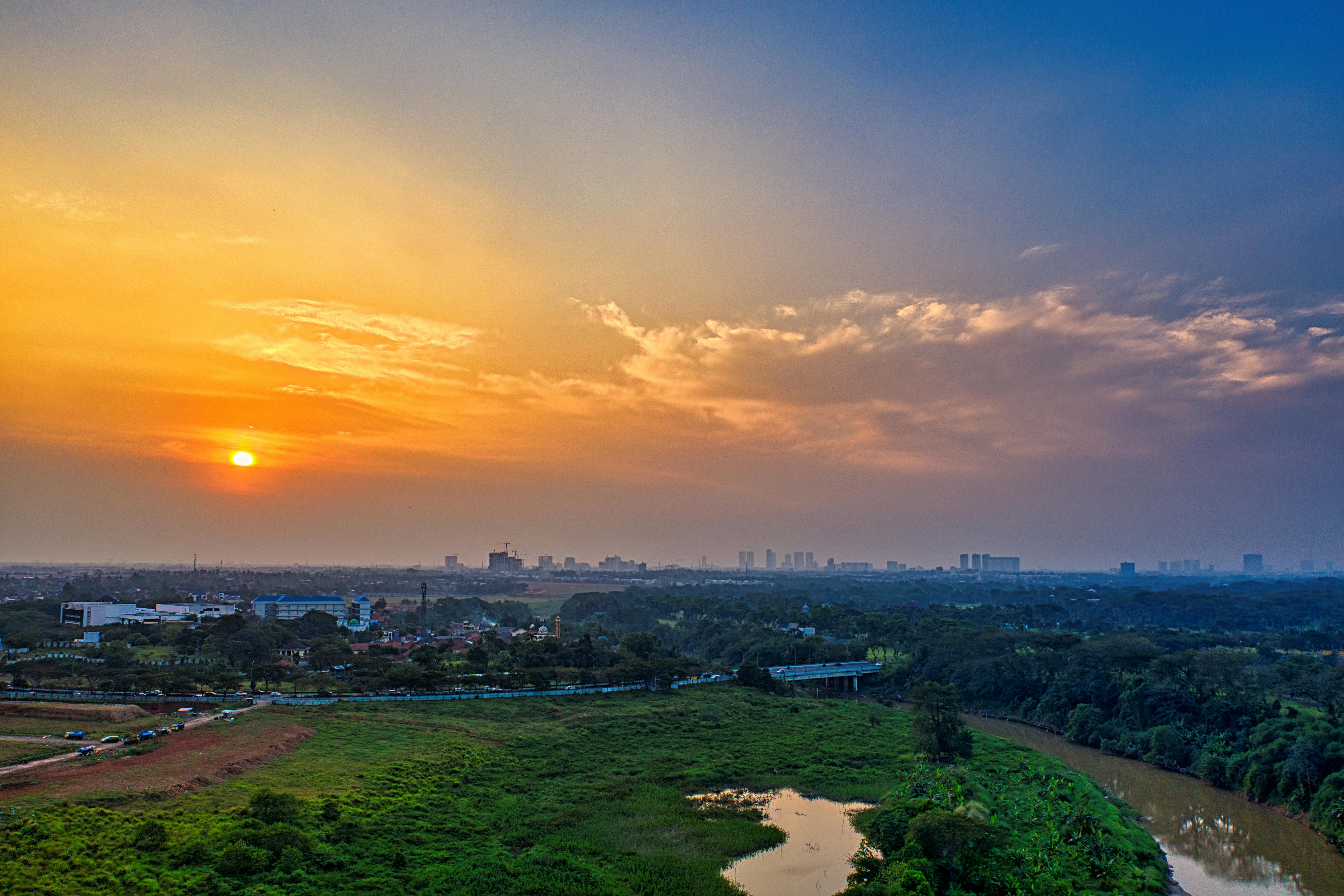 aerial view of city during sunset