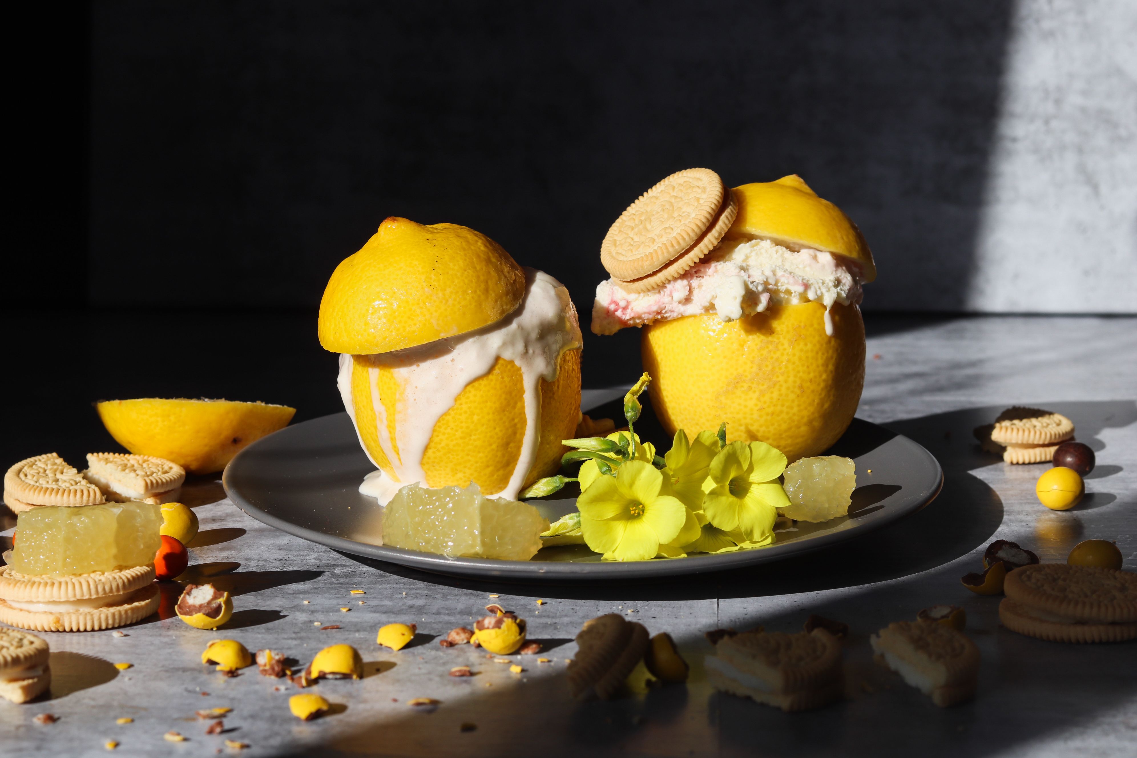 Italian biscotti next to limoncello and ice cream dessert