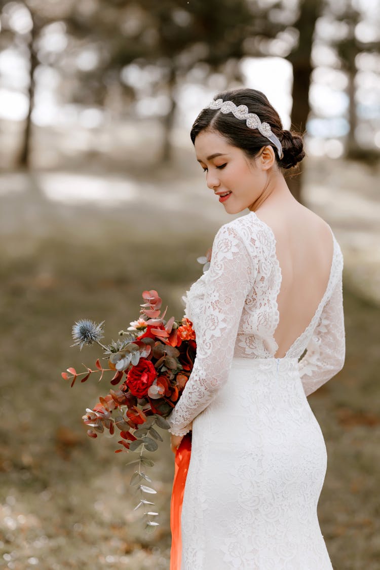 Young Asian Woman In Bridal Dress