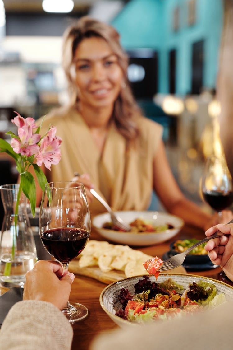 Couple Eating Dinner In A Restaurant 