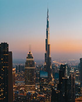 A stunning view of the Dubai skyline with Burj Khalifa during a vibrant dusk.