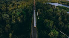 Aerial Photography of a Train Traveling on a Railroad Track