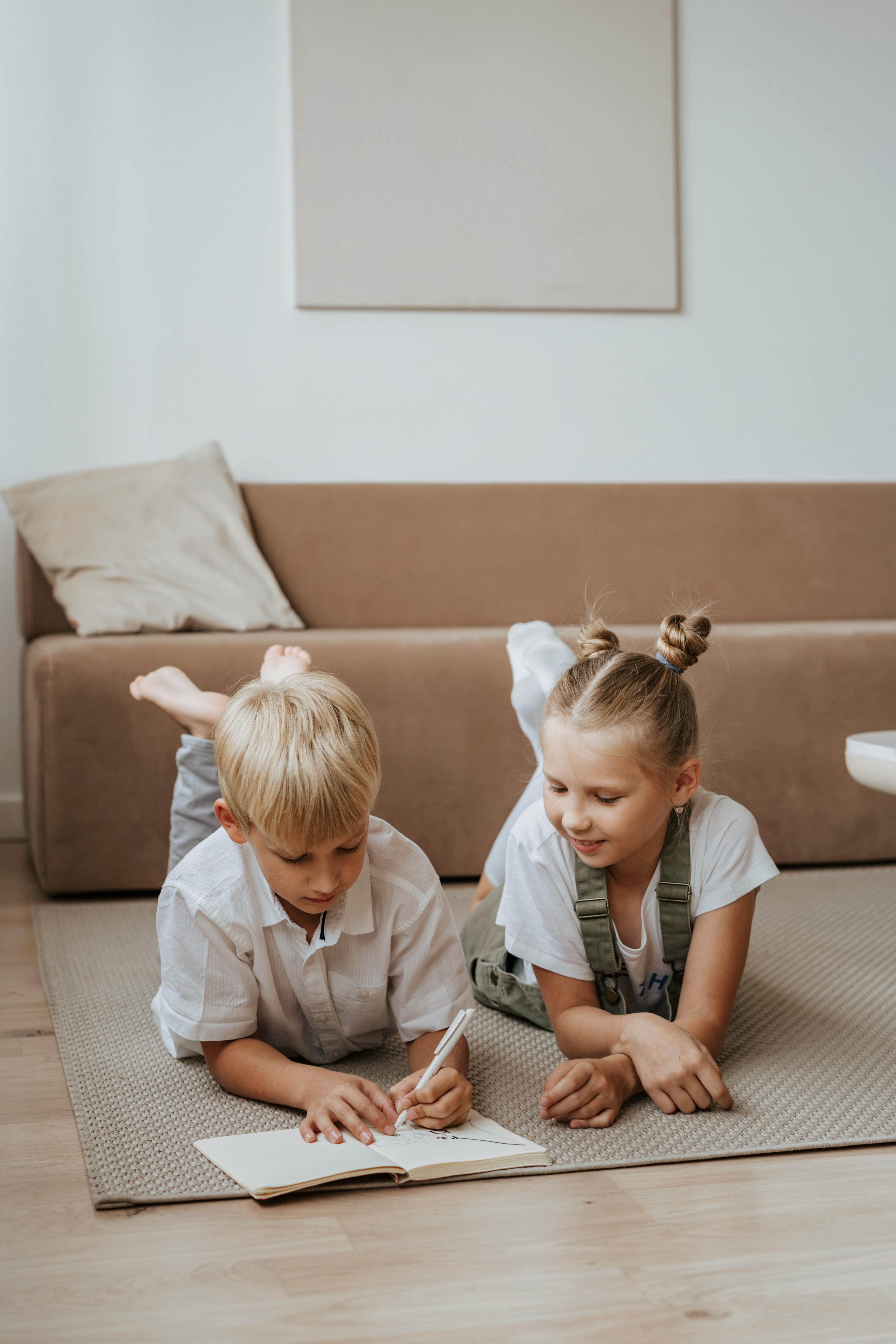 Focused students doing homework at home \u00b7 Free Stock Photo