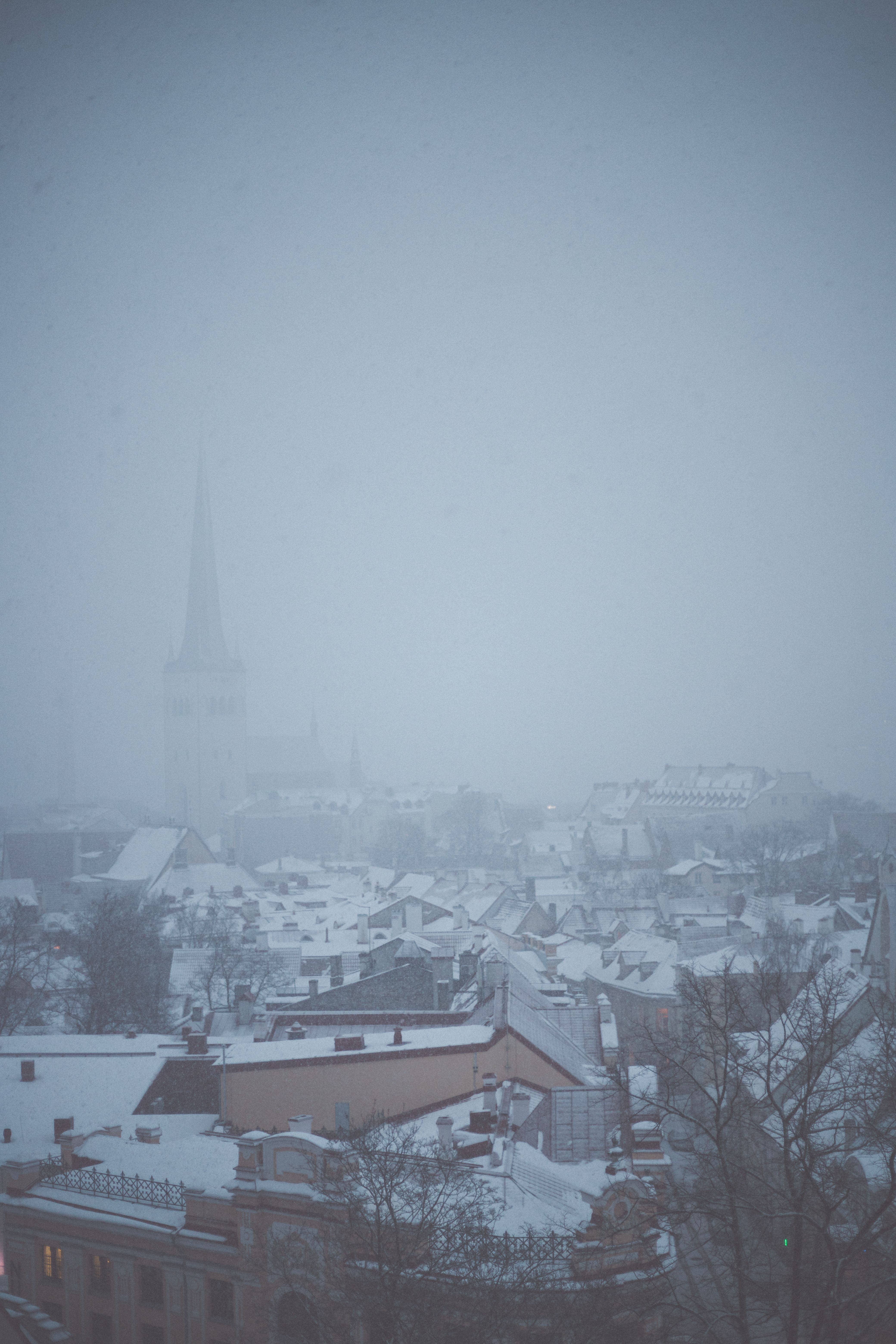 Aerial View of City Buildings Covered with Snow · Free Stock Photo