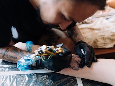 Tattoo artist at work