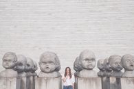 Gray Concrete Statue of Man and Woman